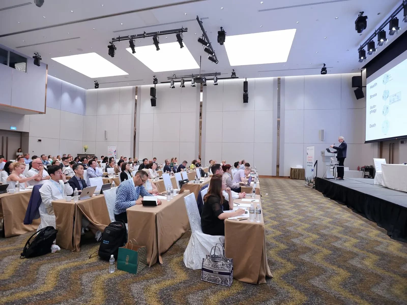 Lecture hall session at NUS's Intensive Course on Healthy Longevity launched alongside its new Healthy Longevity Graduate Certificate Singapore.